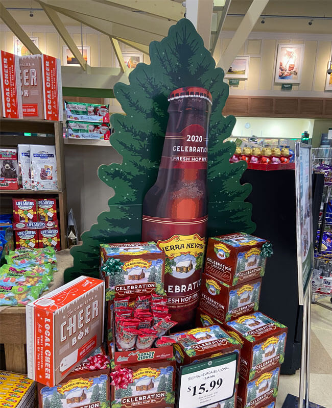 Seasonal Beverage Display Ideas a holiday-themed beverage display with festive graphics