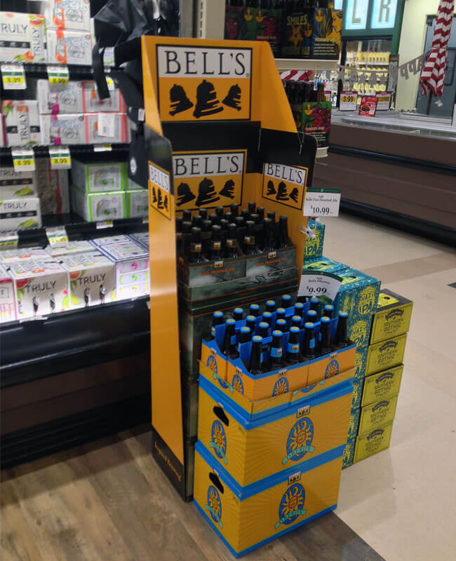 A collection of custom retail displays in a store aisle