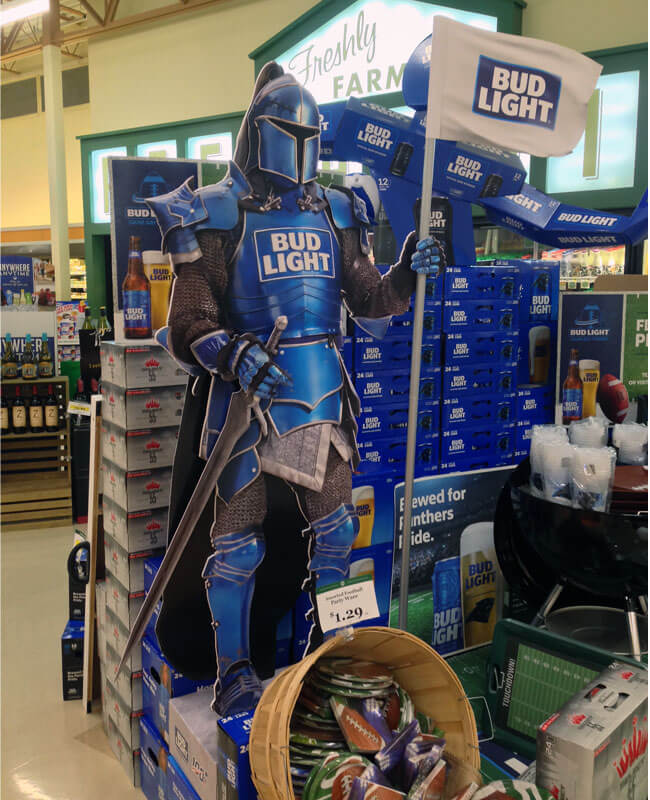 Custom Beverage Retail Displays a collection of custom cardboard beverage displays in a retail store