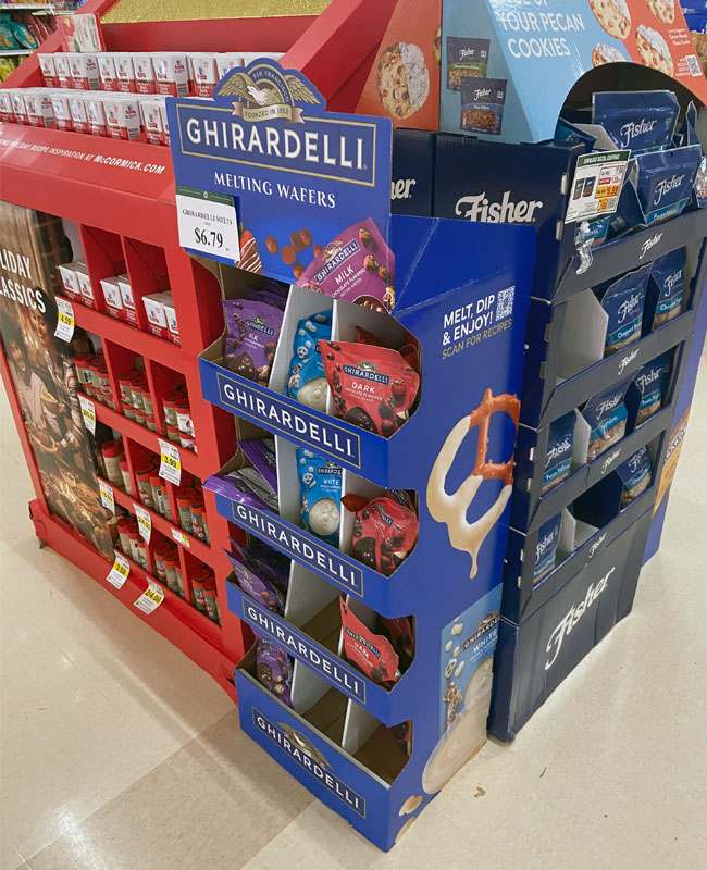 a cheap, broken display next to a premium, successful display in a store