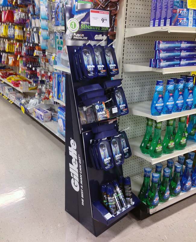 three real examples of cardboard displays with their prices