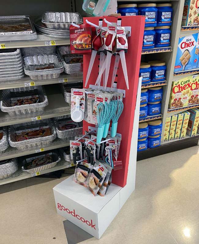 a brand manager looking at a flowchart to choose a display